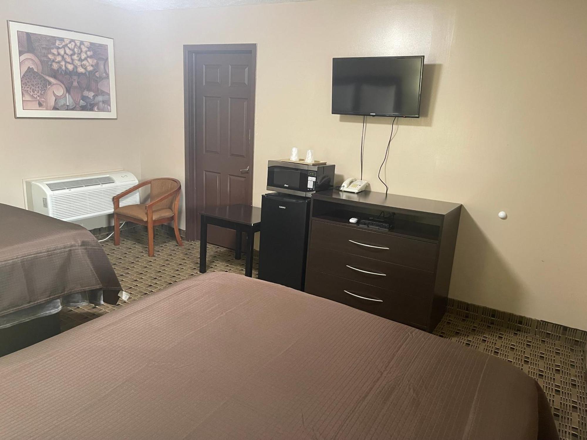Economy Inn & Suites Аштабьюла Экстерьер фото